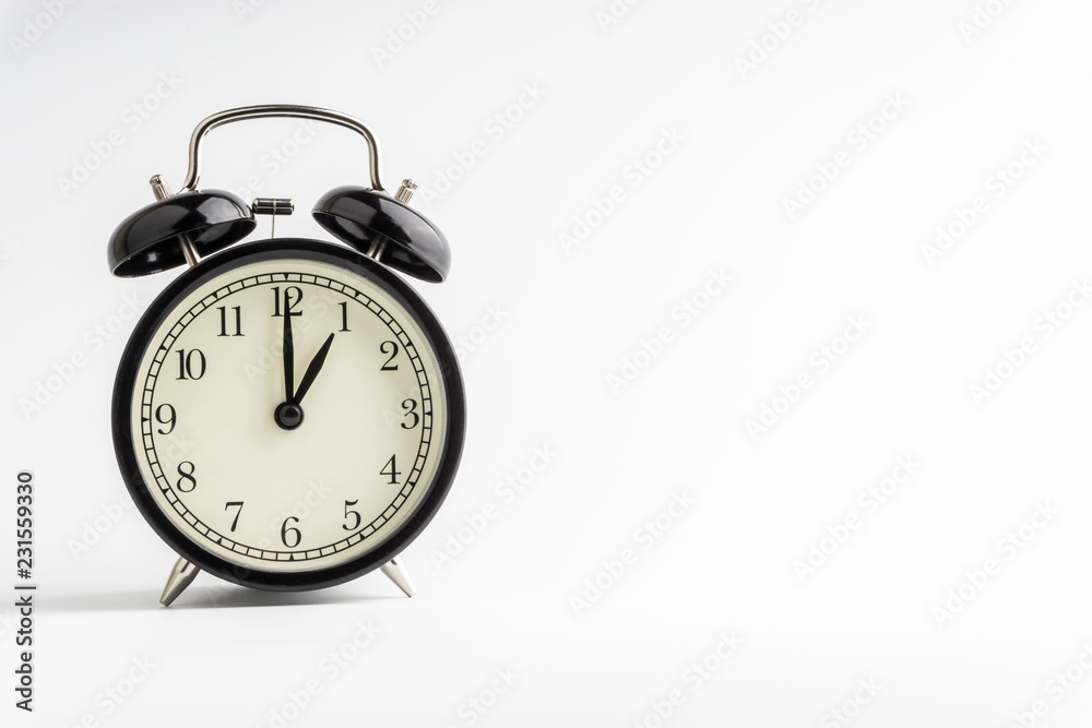 Clock isolated on white background with selective focus and crop fragment Clock isolated on white background with selective focus and crop fragment