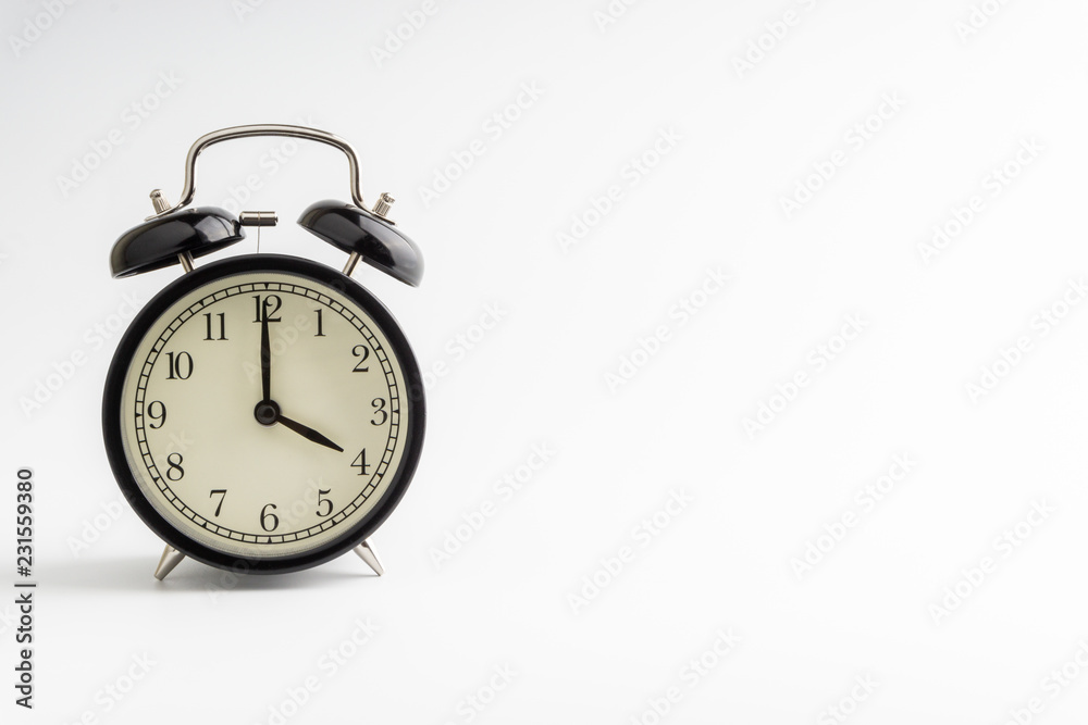 Clock isolated on white background with selective focus and crop fragment Clock isolated on white background with selective focus and crop fragment