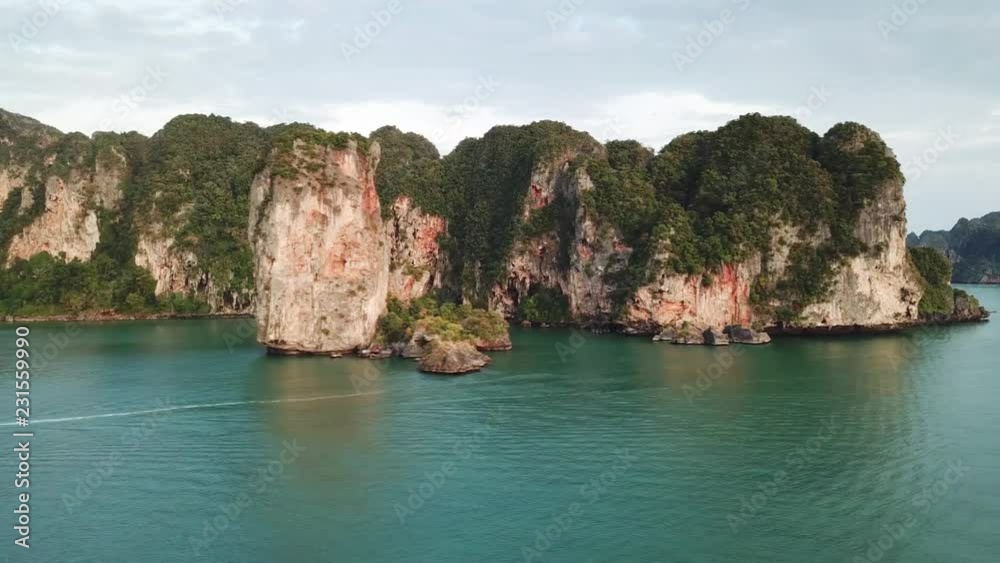 Aerial view of tropical turquoise lagoon, beach between rocks and islands, Krabi, Railay, Thailand, 4k Aerial view of tropical turquoise lagoon, beach between rocks and islands, Krabi, Railay, Thailand, 4k