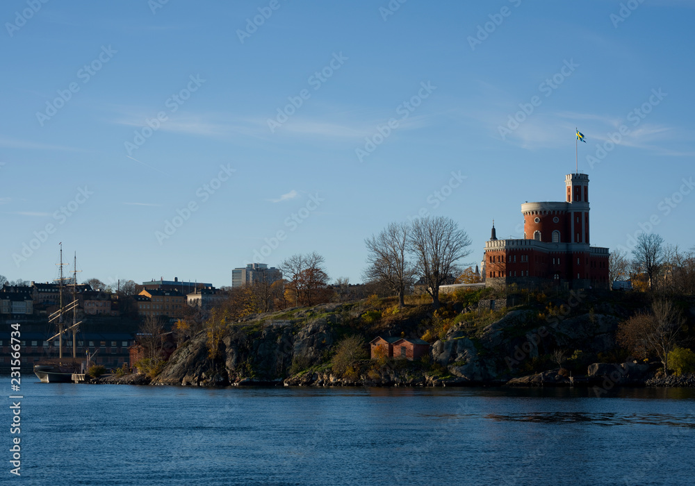 Boats and landmarks in Stockholm harbour a sunny autumn morning