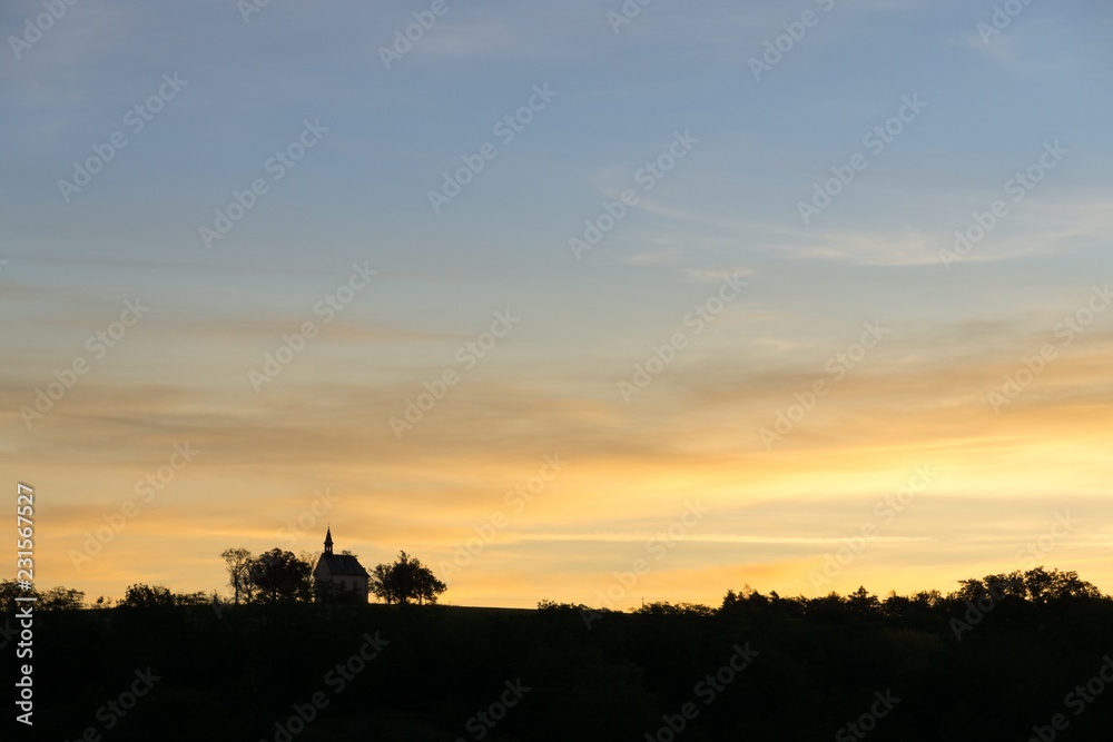 Chapel on the hill during sunrise. Czech Republic