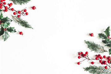 Christmas composition. Frame made of christmas plants on white background. Flat lay, top view, copy space