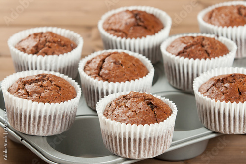 Homebaked Muffins With Chocolate, Banana, Coconut In Baking Tray.