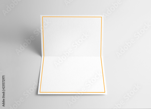 Blank folded thank you or greeting card with gold ribbon 