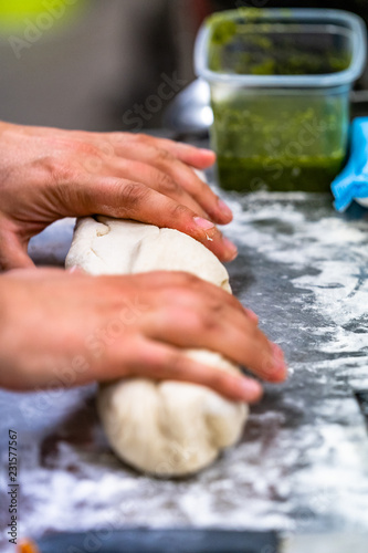 Female Chef Preparing Bread Dough for Selfmade Bread and Patties