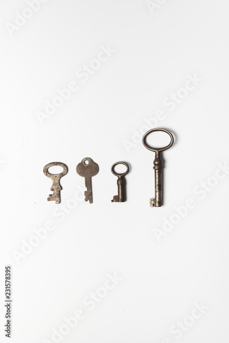 Four old keys on white background © jlramos