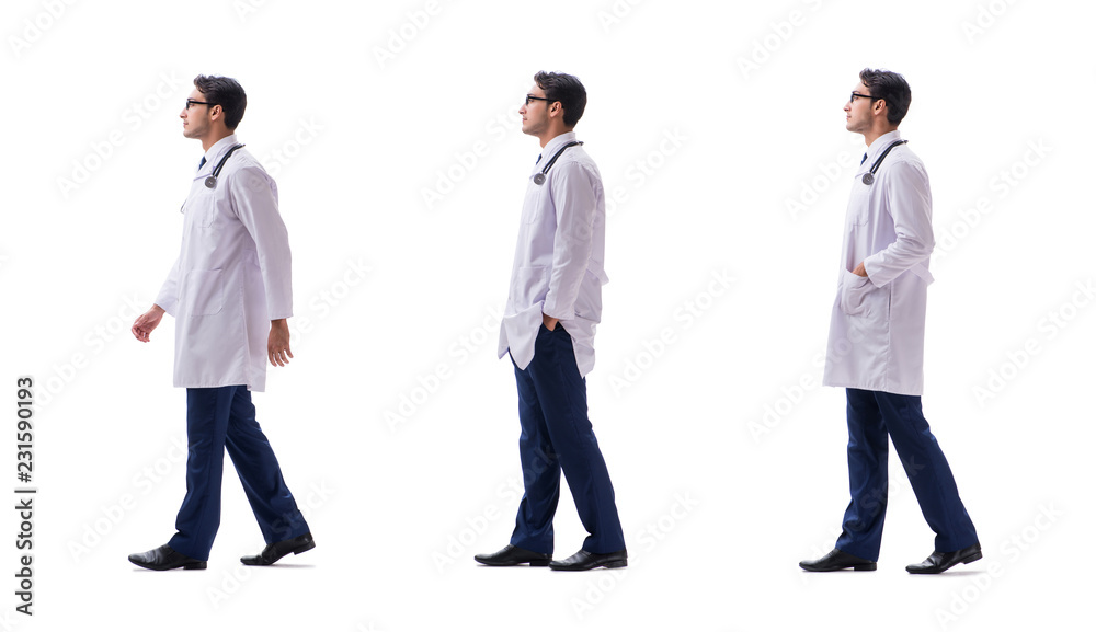 Obraz premium Young doctor physician standing walking isolated on white backgr