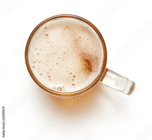 top view of mug of beer isolated on white background