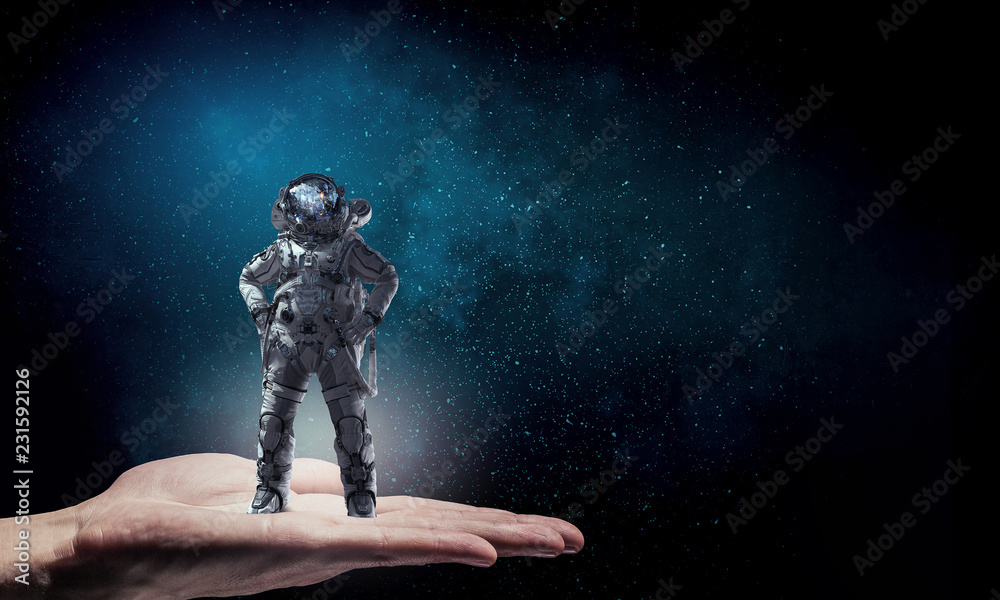 Fototapeta premium Astronaut on his mission. Mixed media