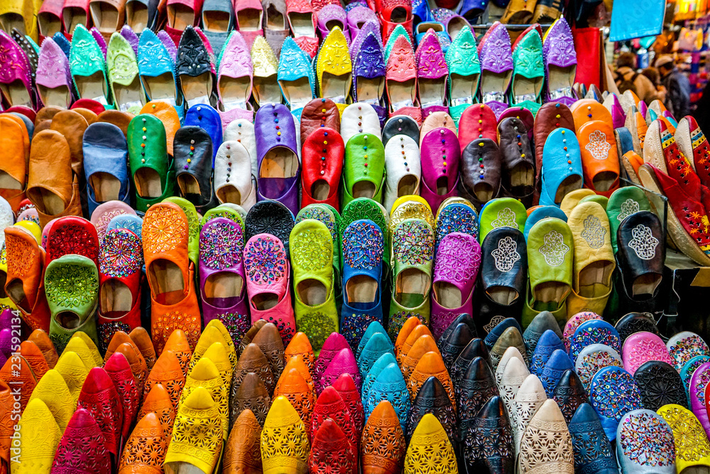 A display of bright, colorful leather, Moroccan style shoes and slippers in  the Marrakesh souk bazaar in Morocco Stock Photo | Adobe Stock