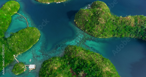 Aerial view of Sugba lagoon. Beautiful landscape with blue sea lagoon, National Park, Siargao Island, Philippines