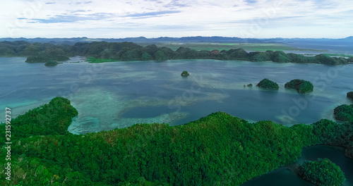Aerial view of Sugba lagoon. Beautiful landscape with blue sea lagoon, National Park, Siargao Island, Philippines