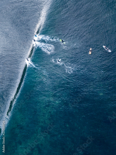 Aerial view of surfers © Graham