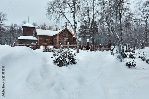 Old wooden church in winter © Gudellaphoto