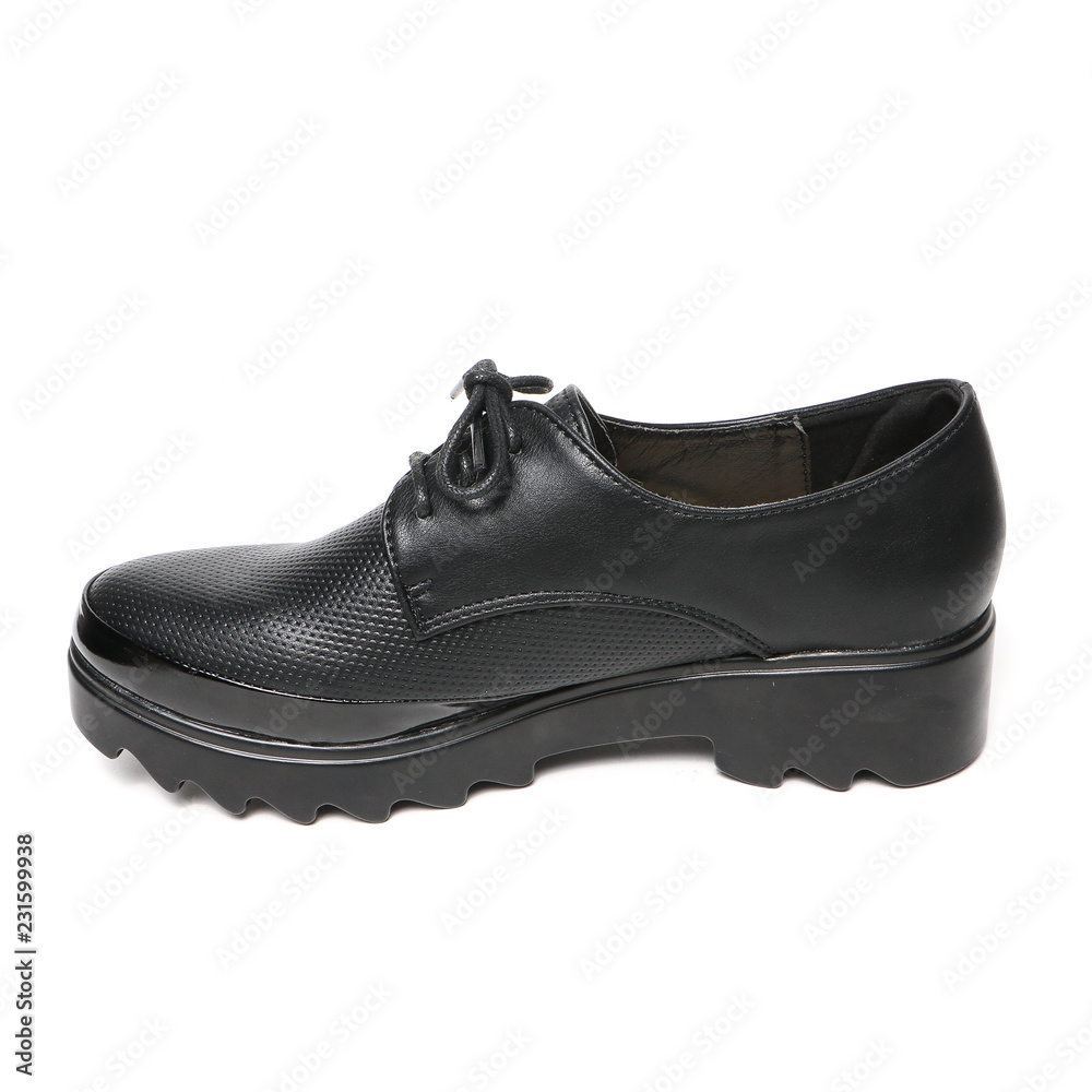 Women's platform black shoes isolated on white background Women's platform black shoes isolated on white background