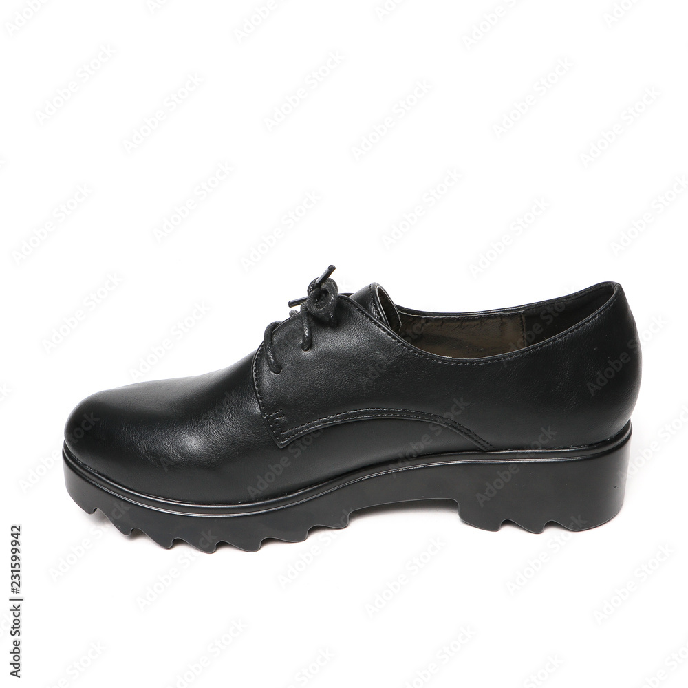 Women's platform black shoes isolated on white background Women's platform black shoes isolated on white background