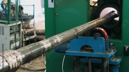 Hardbanding welding process close-up. drill pipe manufacturing process. Enterprise for the manufacture of drilling oil and gas pipes. photo