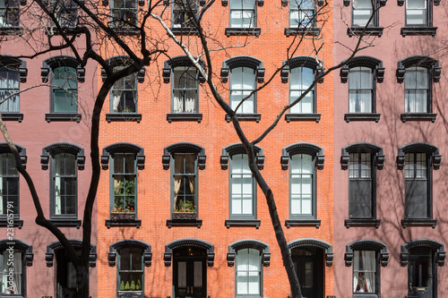 Wall of windows on classic New York City style brick building