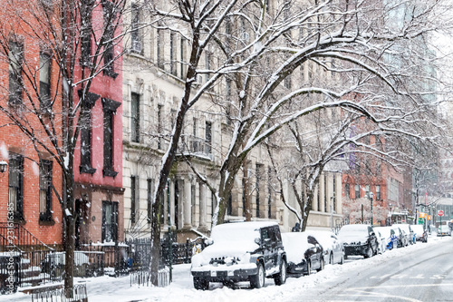Photography Winter scene with snow covered cars parked along Stuyvesant Street in the East V
