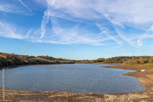 View of Ardingly reservoir in Sussex in autmn with low water reserves photo