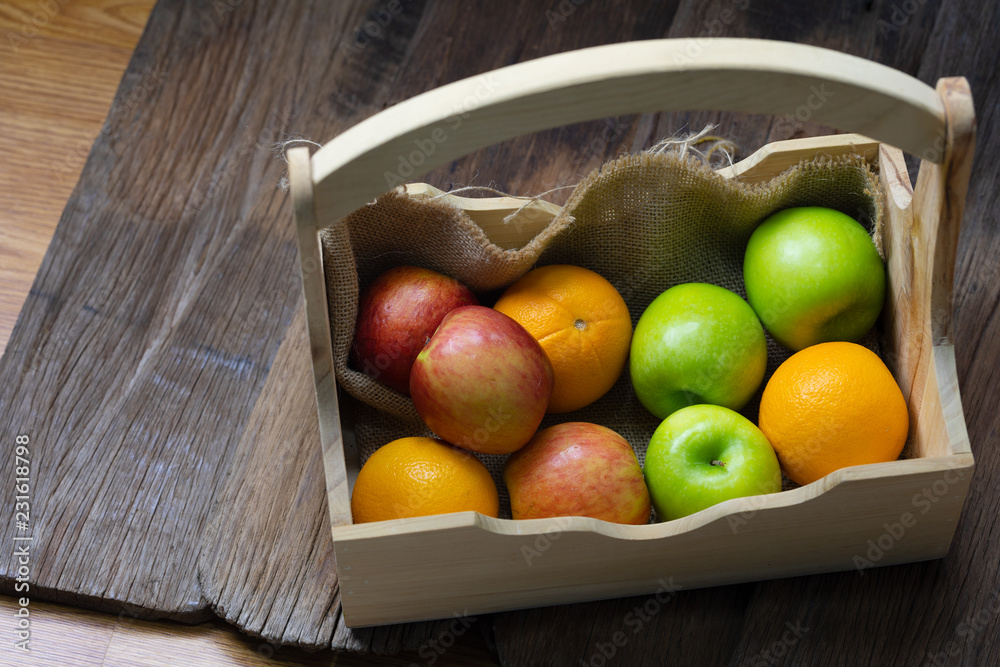 Orange, red apples, green apples in crates, fresh fruits Orange, red apples, green apples in crates, fresh fruits