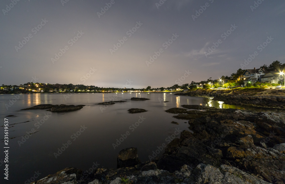 Night view of a residential area by the coast of Victoria, Vancouver Island, British Columbia, Canada