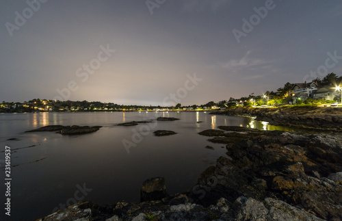 Night view of a residential area by the coast of Victoria, Vancouver Island, British Columbia, Canada
