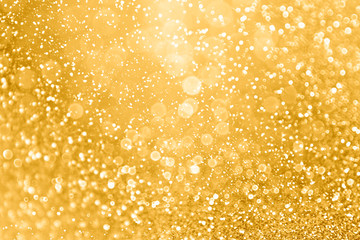 Gold glitter sparkle glam background texture for golden Christmas sparks, wedding anniversary or birthday