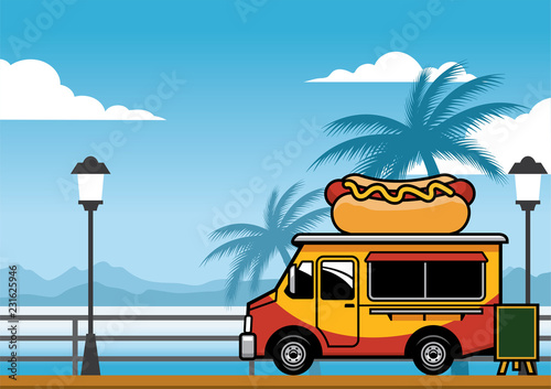 food truck selling hot dog on the beach