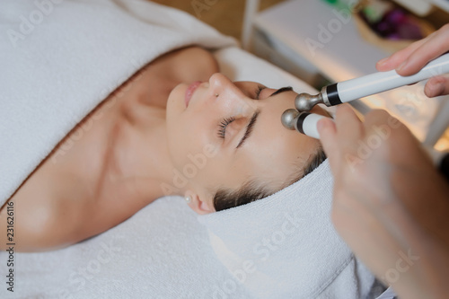 Konstfotografi Lateral view of woman facial massage