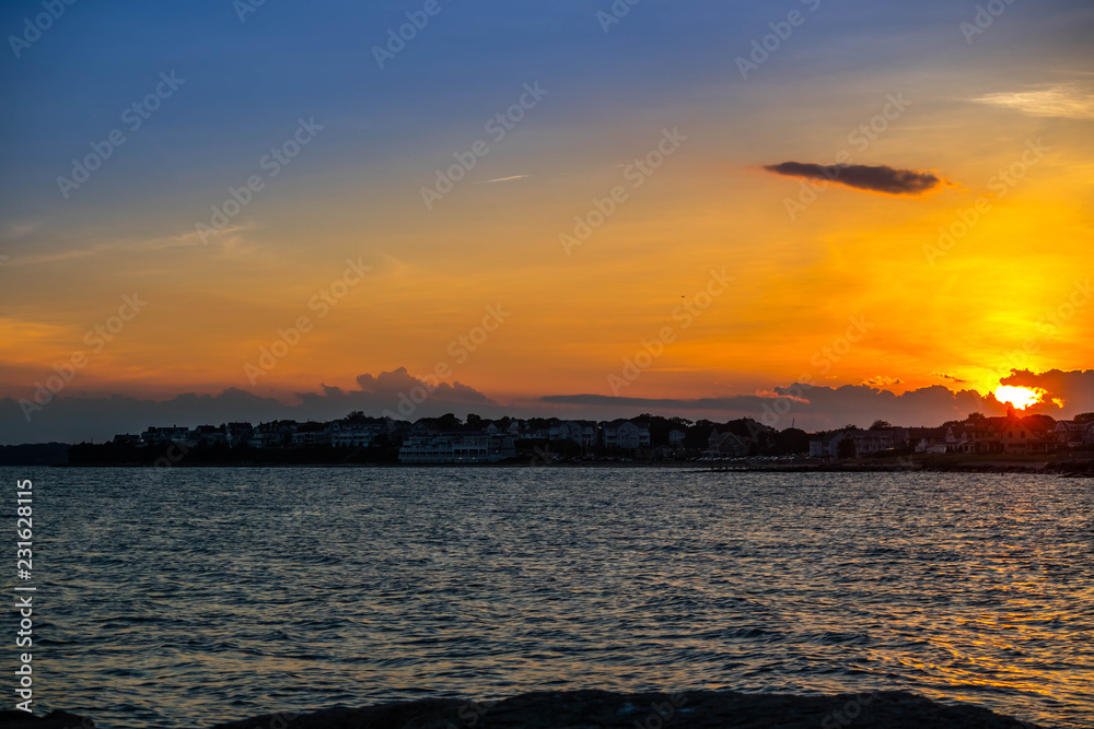 A dramatic vibrant sunset scenery in Cape Cod Martha's Vineyard, Massachusetts