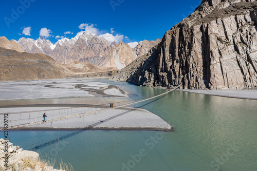 Hussaini Hanging Bridge.Known as the most dangerous bridge in the world, the Hussaini Hanging Bridge is only one of many precarious rope bridges in Northern Pakistan. photo