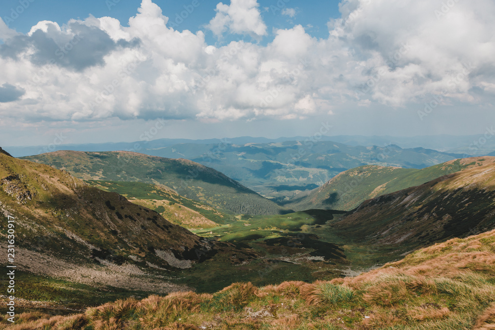 Fototapeta premium Great view of the alpine valley that glowing by sunlight. Picturesque and gorgeous morning scene. Popular tourist attraction. Location place Carpathian, Ukraine, Europe. Artistic picture. Beauty world