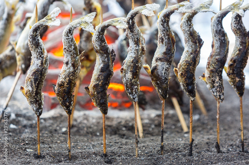 Grilled fresh fish Trouts or iwana yamame at Kegon Waterfall, Nikko , Japan photo