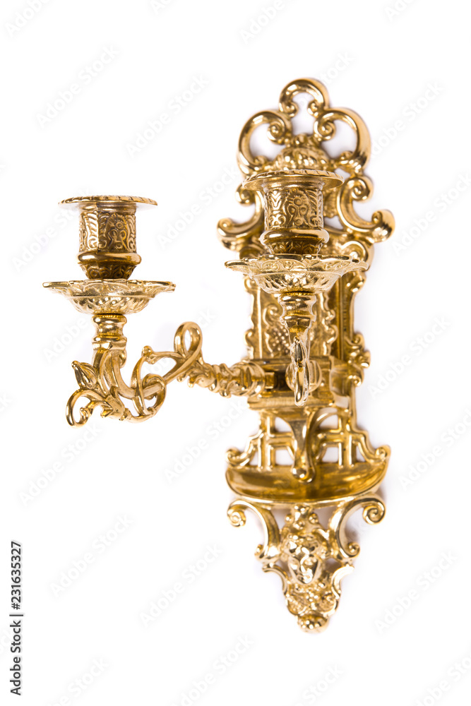 Gold wall candle holder on a white background Gold wall candle holder on a white background