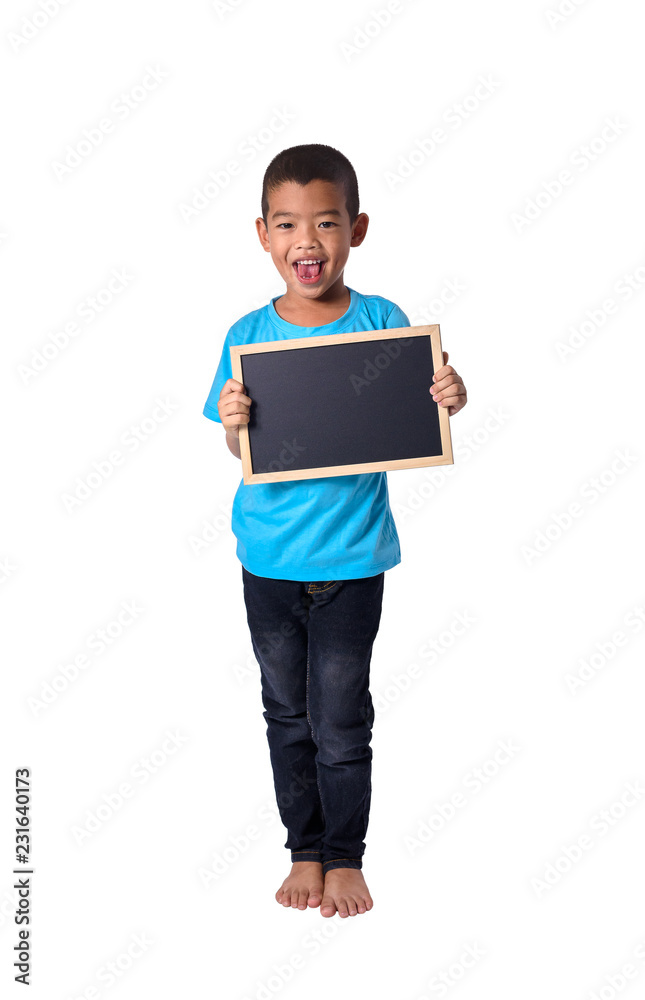 Asian Country boy with blank black chalkboard for education conceptual isolated on white background Asian Country boy with blank black chalkboard for education conceptual isolated on white background