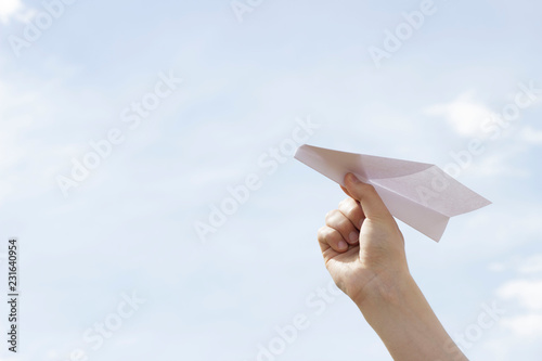 paper airplane. sky background.
