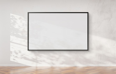 Black frame hanging on a wall mockup 3d rendering