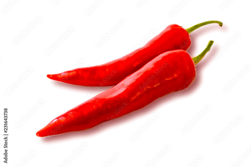 Two hot chilly pepper on the white