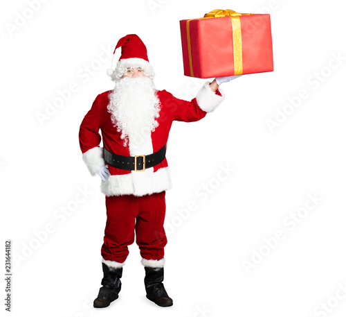 Santa Claus showing the gift box