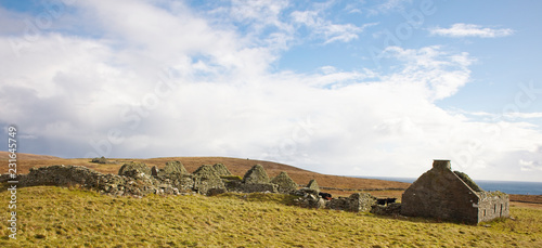 An old crofting hamlet in ruins in a remote part of Bressay, Shetland, Scotland, UK. photo