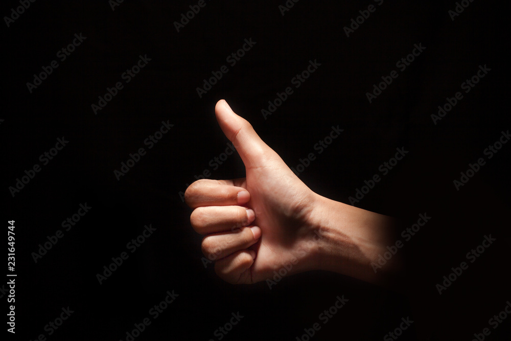 Thumb finger. Mother Finger. Closeup of male hand showing thumbs up sign against white background, Thumb finger. Mother Finger. Closeup of male hand showing thumbs up sign against white background,