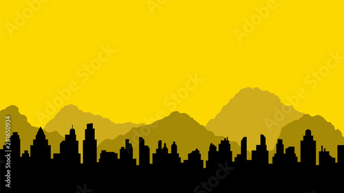 Black silhouette of city and mountains