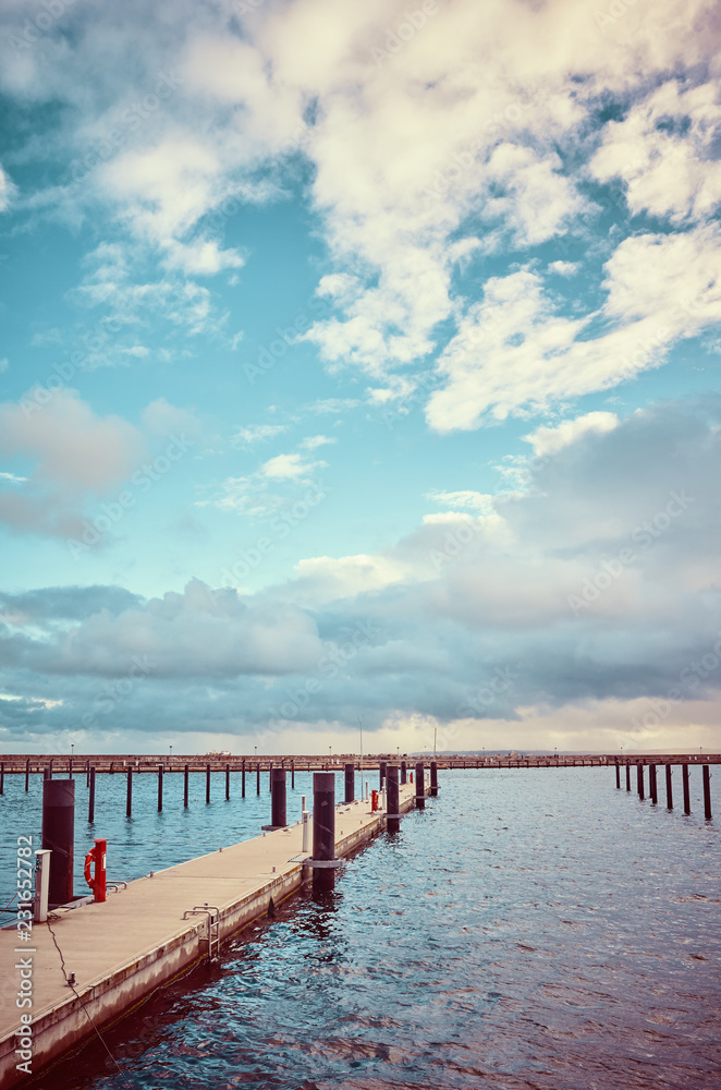 Color toned picture of an empty marina, travel concept.