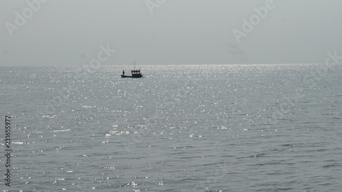 Fishing boats in the sea photo