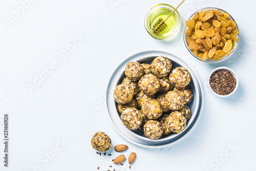 Canvas Print Raisins almond honey bliss balls. Top view, space for text.
