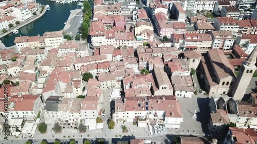 Aerial approach of Basilica in Grado, Italy. photo