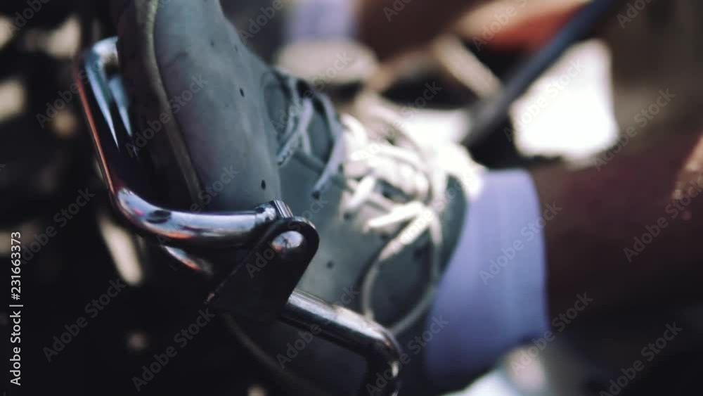 man's foot on the gas pedal racing car. Street karting, entertainment concept, place for text, background, championship, amateur, slow motion