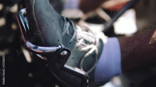 man's foot on the gas pedal racing car. Street karting, entertainment concept, place for text, background, championship, amateur, slow motion