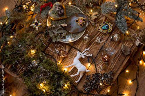 Magic Christmas decorations on wood background